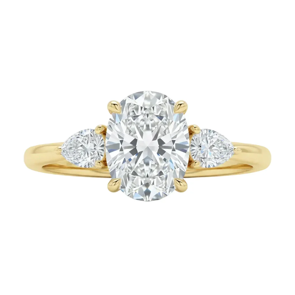 The Oval Pear Trinity – Brilliant Teardrop Accent Ring