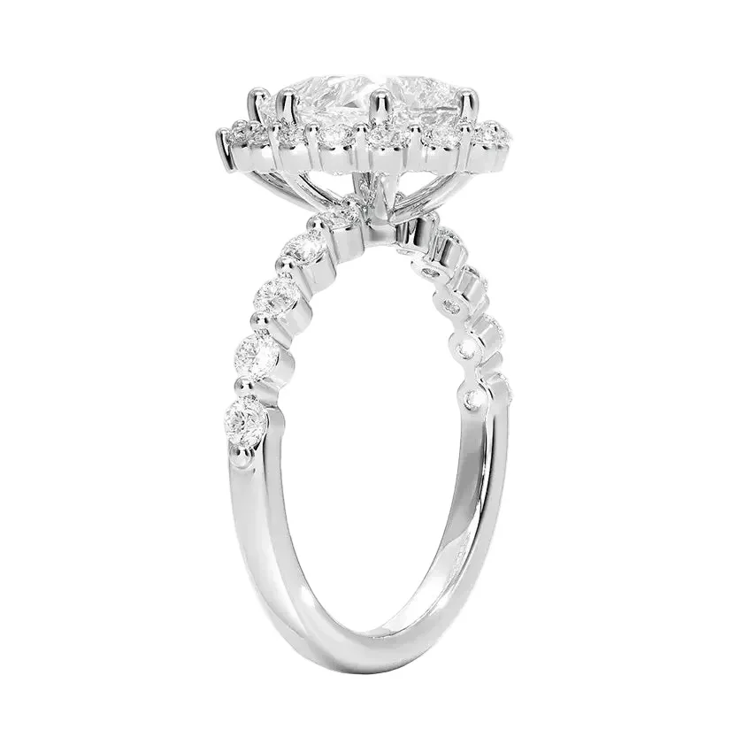 The Vintage Blossom – Floral Halo Pear Moissanite Ring - Image 7
